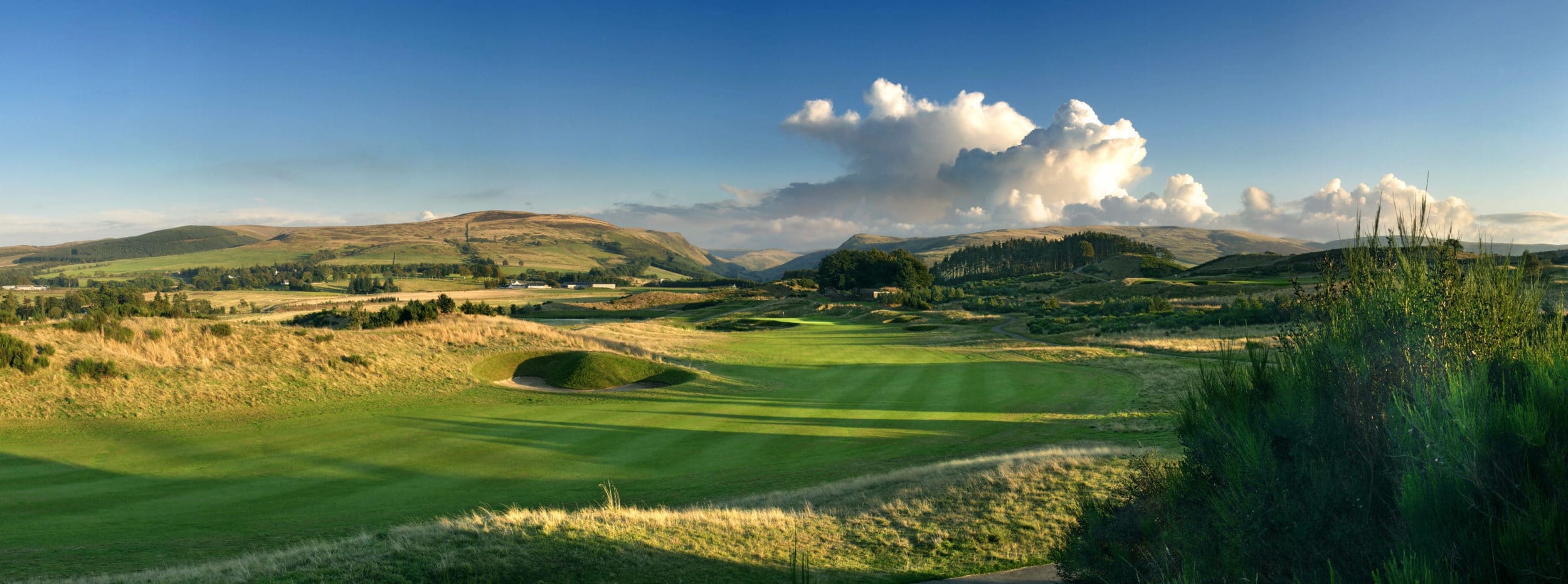 Taken from right ridge on 2nd hole of PGA Centenary Course, The Gleneagles Hotle, Scotland. Shows fairway towards green (centre distance). Glen Devon in background.